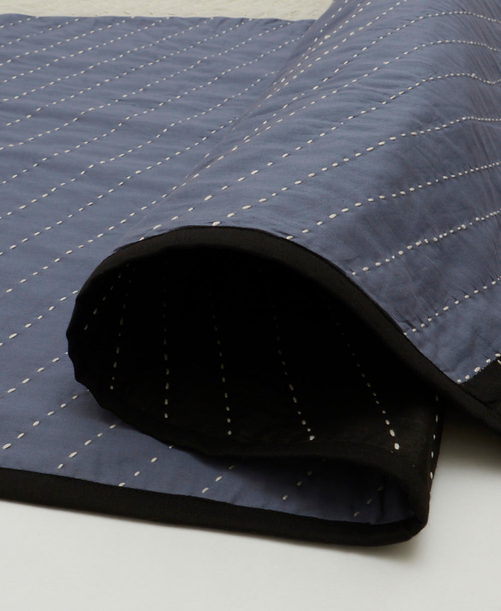 lightweight modern kantha quilt in navy blue with white stitching