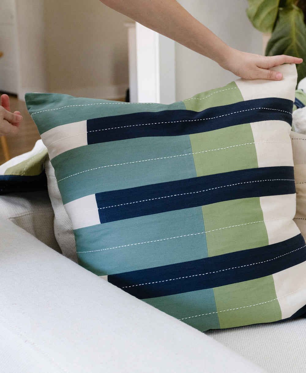 Navy retailer blue cushions and throws