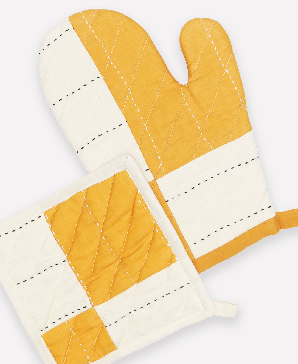 patchwork mustard yellow oven mitt and oven mitt pairing made from organic cotton