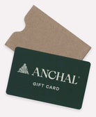 tangible gift card in dark hunter green with tan Anchal logo on front with matching kraft gift card sleeve