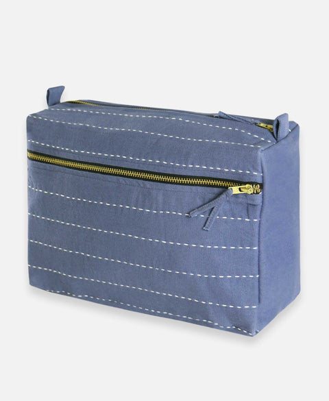 a blue bag with white lines