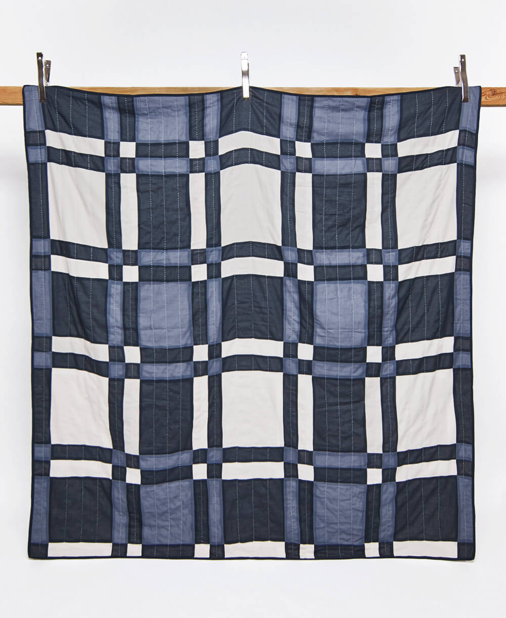 plaid patchwork quilt in navy blue and slate blue plaid