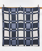 plaid patchwork quilt in navy blue and slate blue plaid