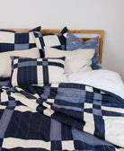 plaid patchwork bedding bundle in navy blue made from 100% organic cotton