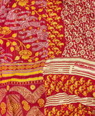 orange and red paisley quilted throw in queen size hand sitched by Anchal artisans