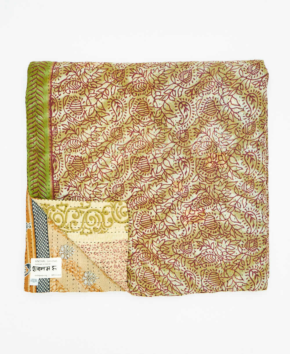 muted floral quilted throw in queen size handmade in India by Anchal artisans