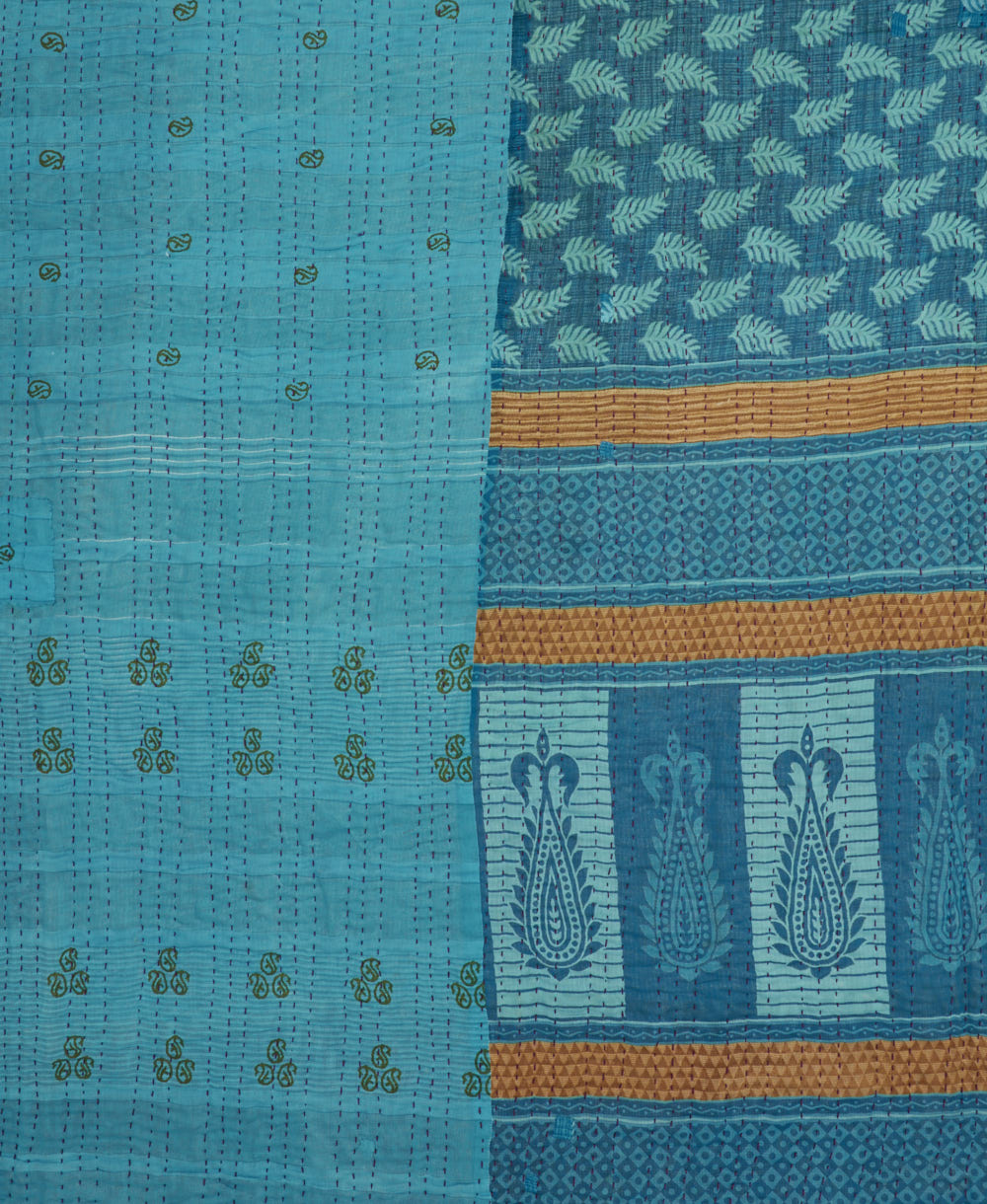 kantha stitched blanket in cerulean blue and red checkered with pink kantha stitching