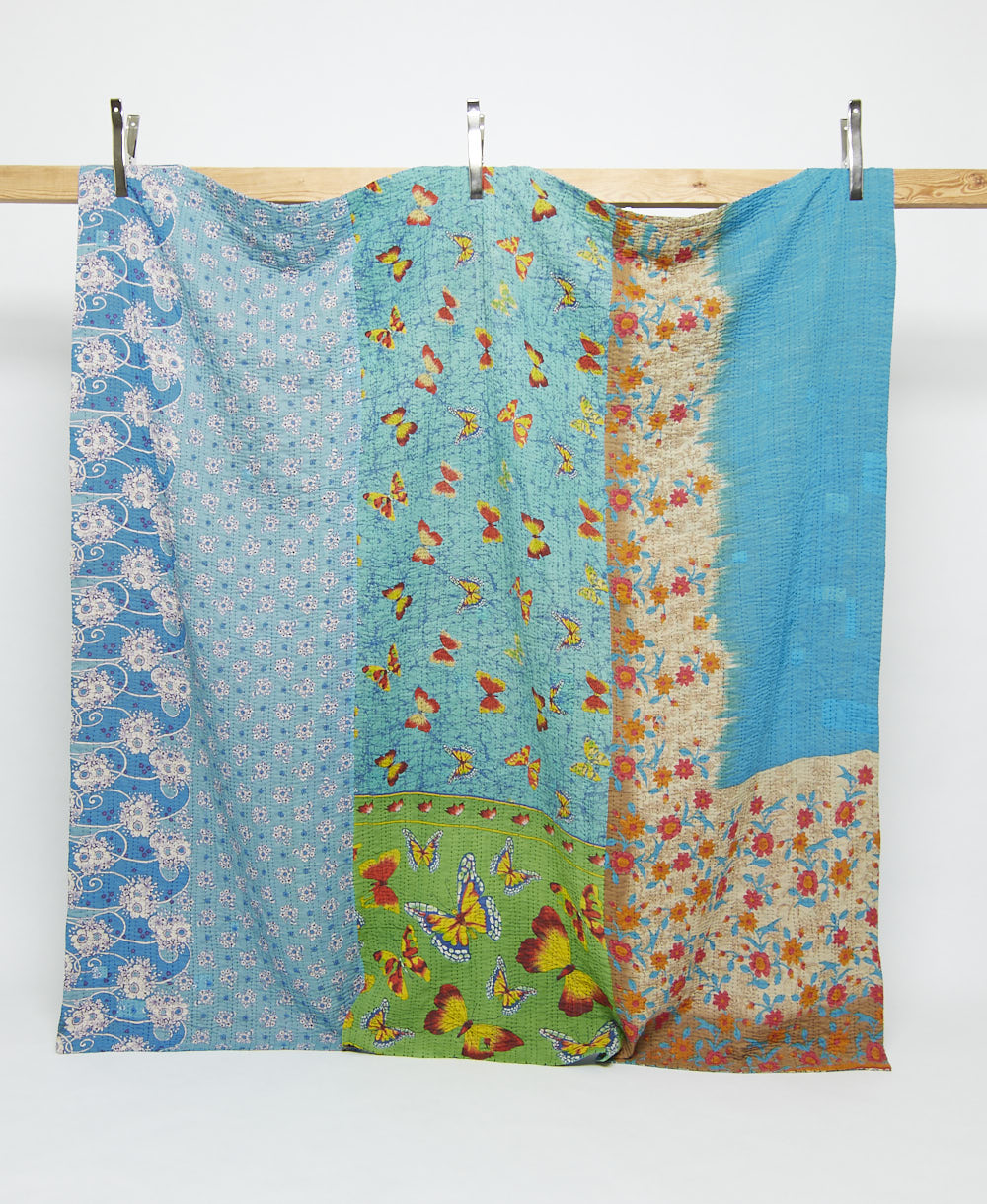 sky blue kantha quilt in queen size with yellow & red butterflies handmade in India by women artisans