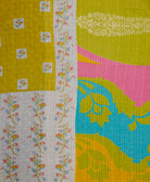 queen kantha quilt in lime green with pink and blue accents handmade in India from vintage cotton saris