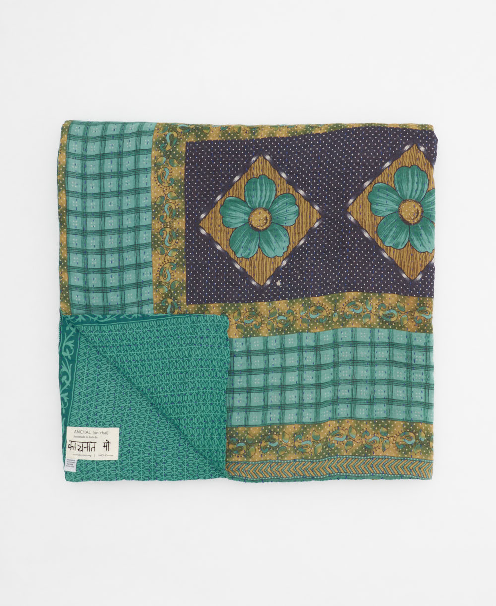 ethically made queen kantha quilt in teal with mustard yellow floral stripes made by Anchal artisans