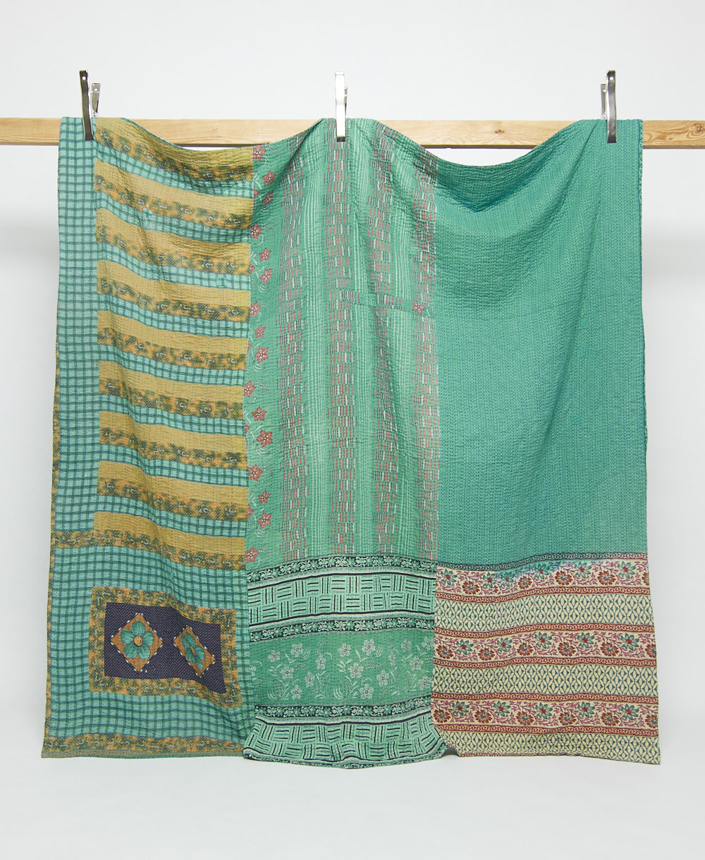 teal queen kantha quilt with mustard floral stripe patterns handmade in India