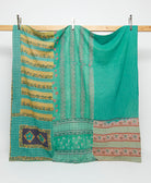 teal queen kantha quilt with mustard floral stripe patterns handmade in India