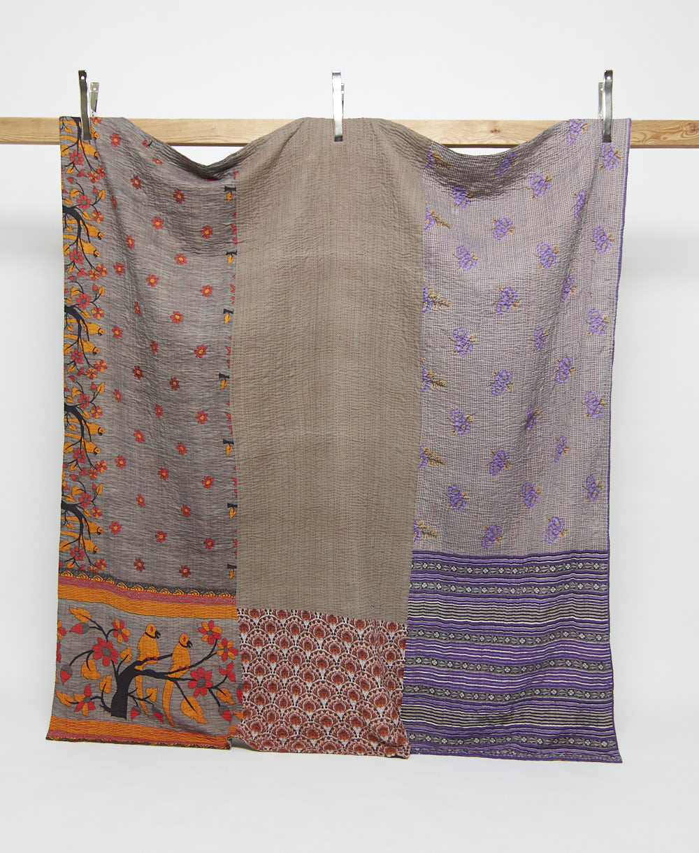 purple-grey queen kantha quilt with a novelty orange bird print handmade in India