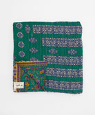 ethically made queen kantha quilt in ocean teal with a bold white floral pattern made by Anchal artisans