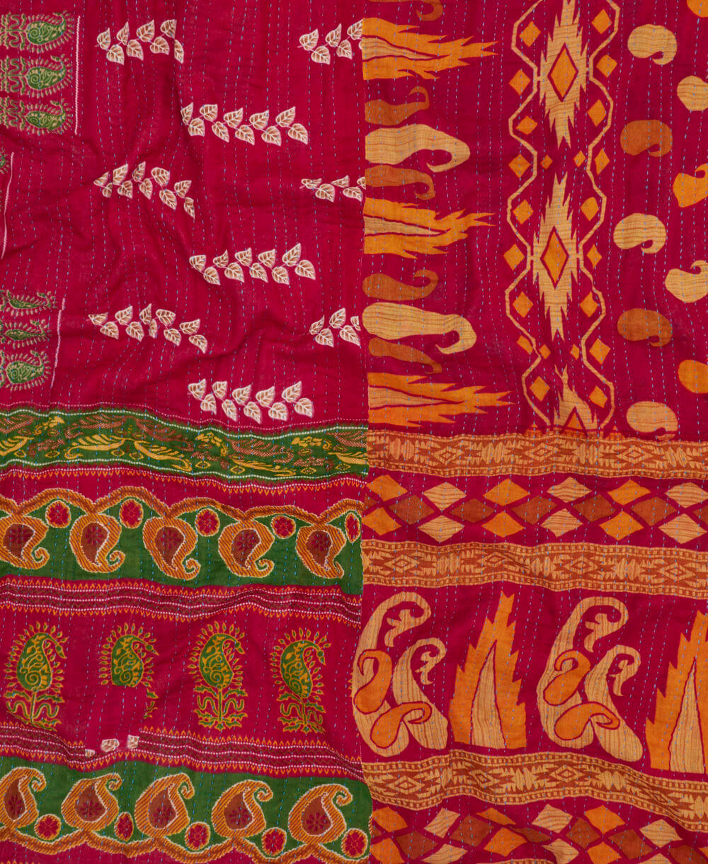 artisan-made kantha quilt in crimson red and marigold yellow geometric design made from upcycled vintage cotton saris