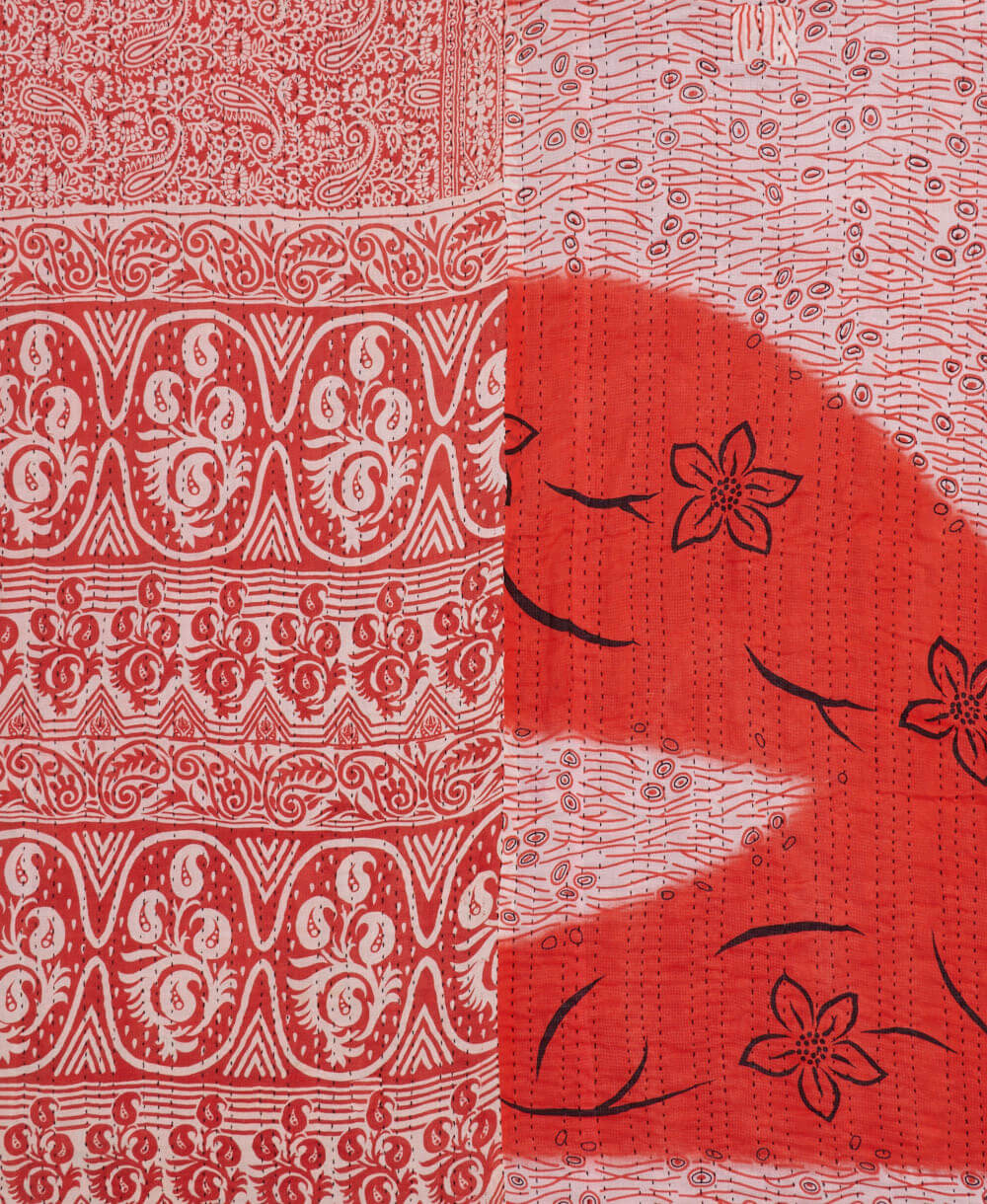 artisan-made kantha quilt in coral and golden bird design made from upcycled vintage cotton saris