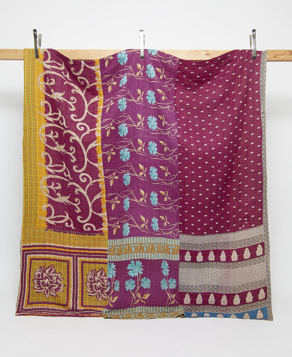 magenta-purple and cerulean blue floral print queen kantha quilt handmade in India from vintage cotton saris