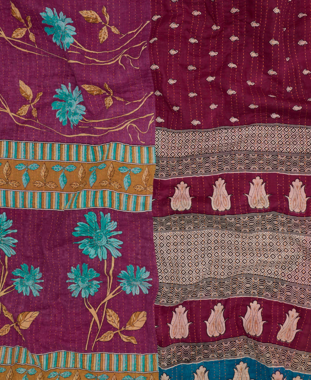 magenta-purple kantha blanket in queen size with a cerulean blue floral pattern