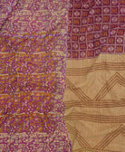 mauve geometric kantha blanket in queen size with a light tan leaf pattern