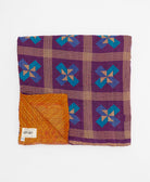 ethically made queen kantha quilt in pumpkin orange with a blue & purple triangle design made by Anchal artisans