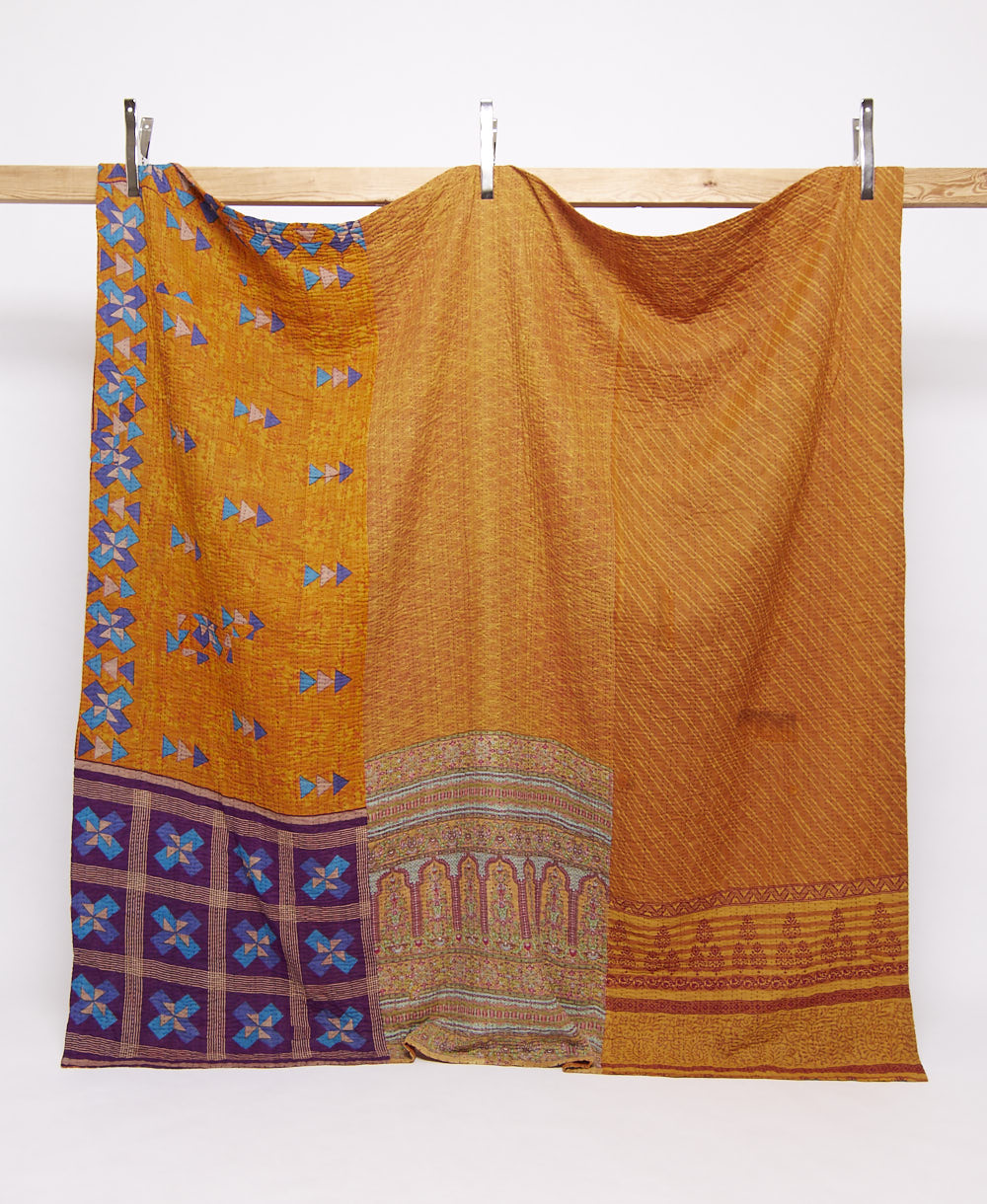 pumpkin orange geometric print queen kantha quilt handmade in India from vintage cotton saris