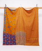 pumpkin orange geometric print queen kantha quilt handmade in India from vintage cotton saris