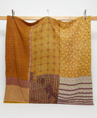 mustard and brown geometric print queen kantha quilt handmade in India from vintage cotton saris