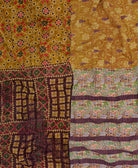 artisan-made kantha quilt in mustard yellow geometric design made from upcycled vintage cotton saris