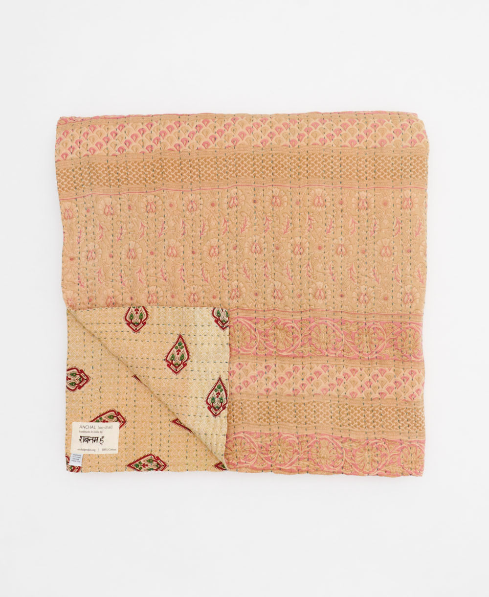 ethically made queen kantha quilt in sandy beige with a pink and green floral design made by Anchal artisans