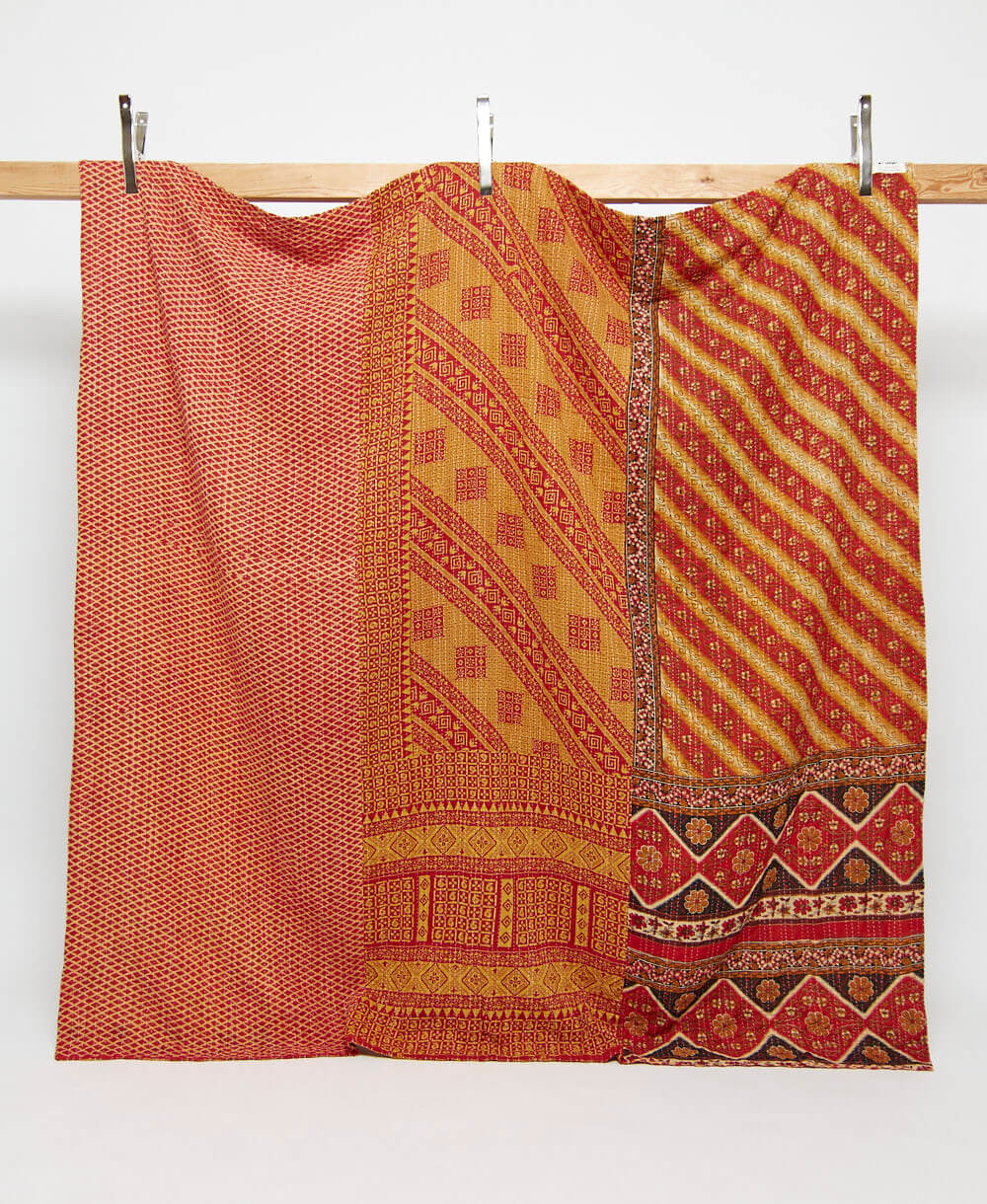 orange & red diagonal stripe print queen kantha quilt handmade in India from vintage cotton saris