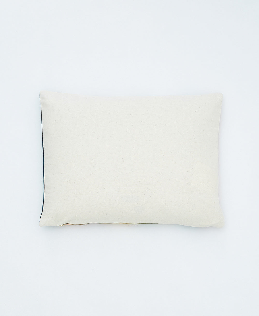 back of rainbow small pillow in solid natural white by Anchal