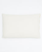 back of mustard yellow shift lumbar pillow in natural white