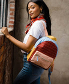 handmade colorblock backpack handbag in rust, sky blue, blush pink and mustard yellow made from organic cotton