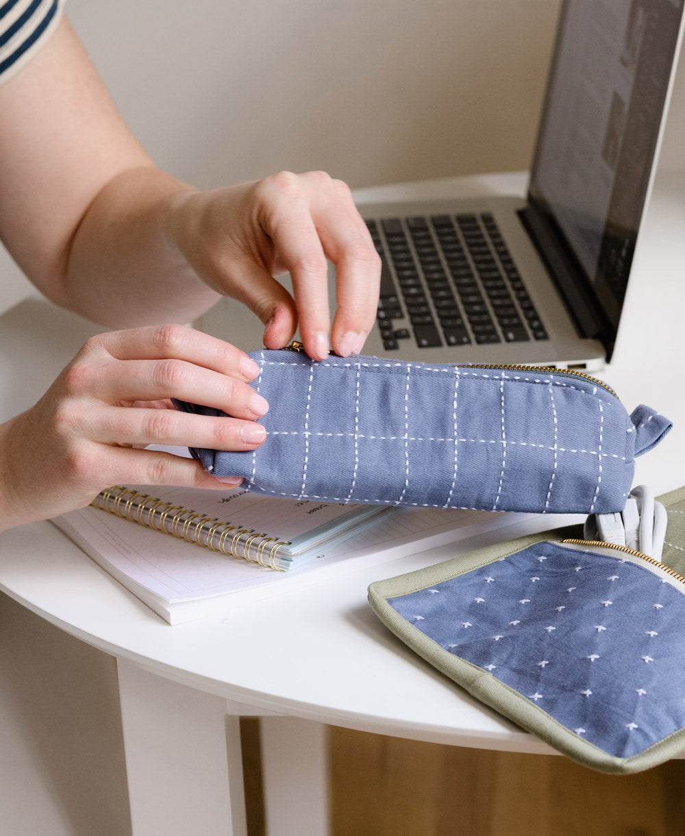 slate blue grid patterned zippered pencil case or small toiletry bag