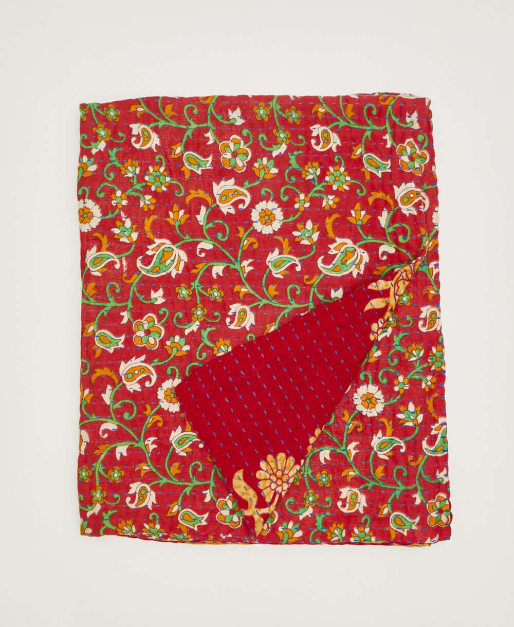 sustainable cherry red small throw quilt created using repurposed vintage cotton saris