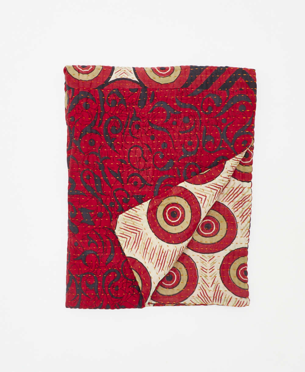 red and black small kantha quilt throw made using circle print
recycled vintage saris