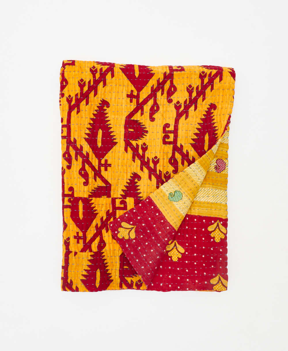 red and yellow small kantha quilt throw made using geometric
recycled vintage saris