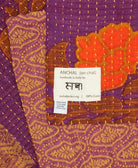 small kantha blanket in eggplant & tan diamond print with signature of the maker on the tag
