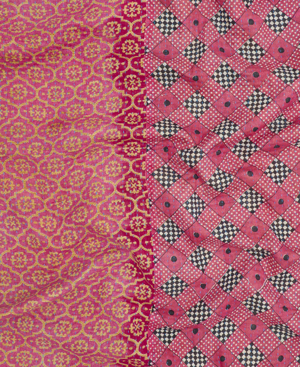 hot pink kantha blanket with black and white checkered print and sky blue kantha stitching