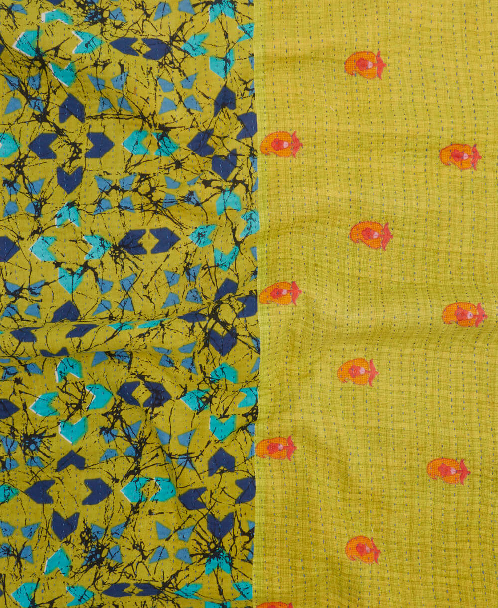 lime green kantha blanket with orange paisley print and sky blue kantha stitching