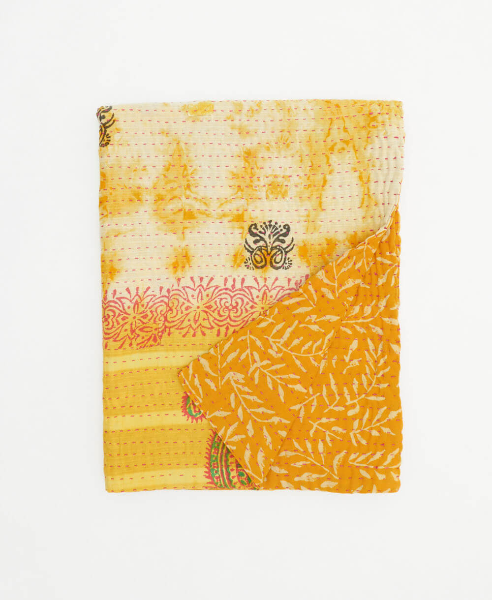 sunshine yellow small kantha quilt handmade in India by women artisans from vintage cotton saris