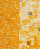 sunshine yellow kantha blanket with tie dye print and red kantha stitching