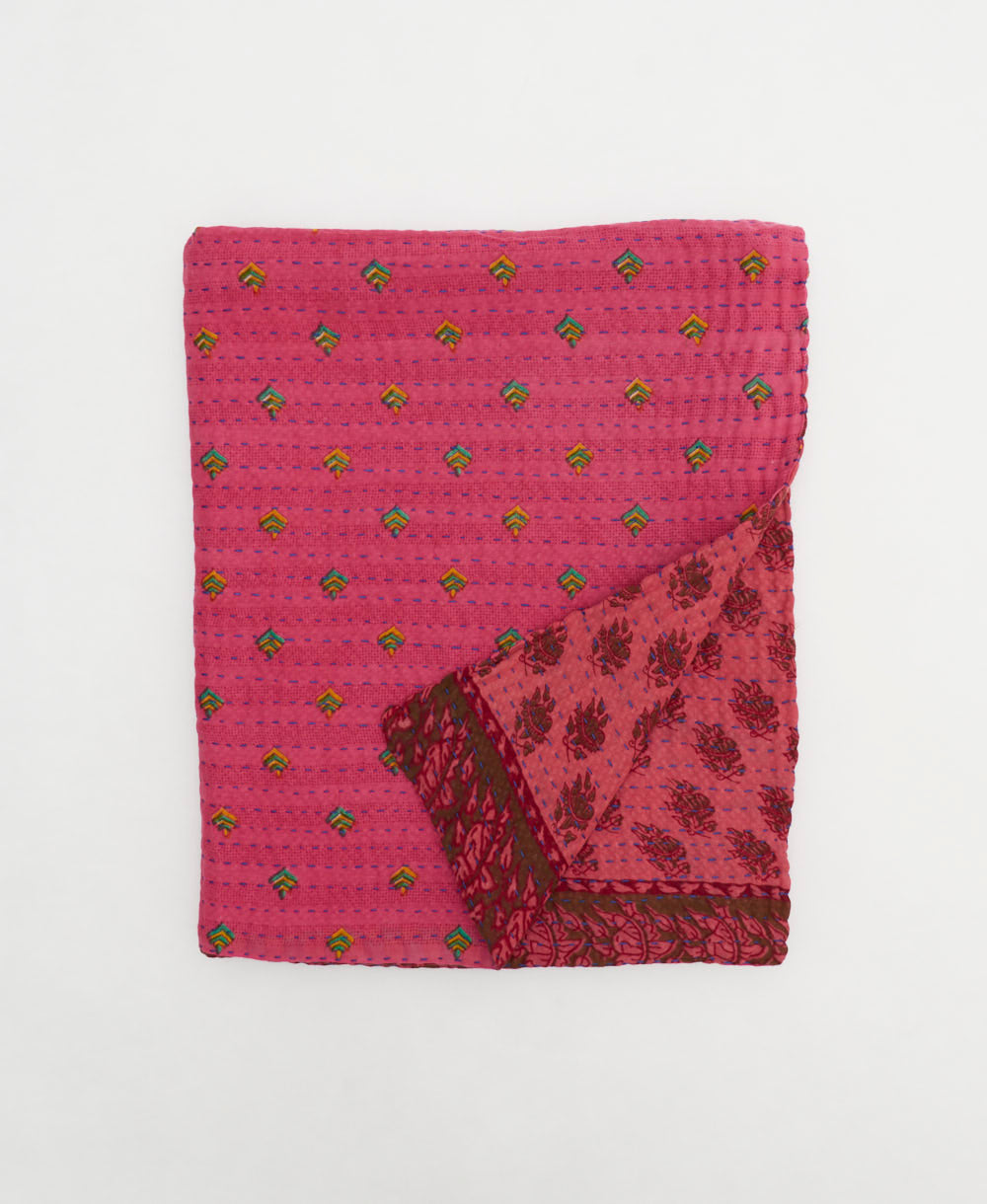 hot pink floral small kantha quilt handmade in India by women artisans from vintage cotton saris