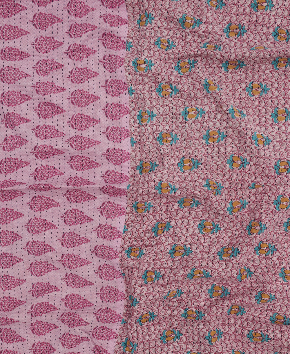 orchid pink kantha blanket with teal floral print and black kantha stitching