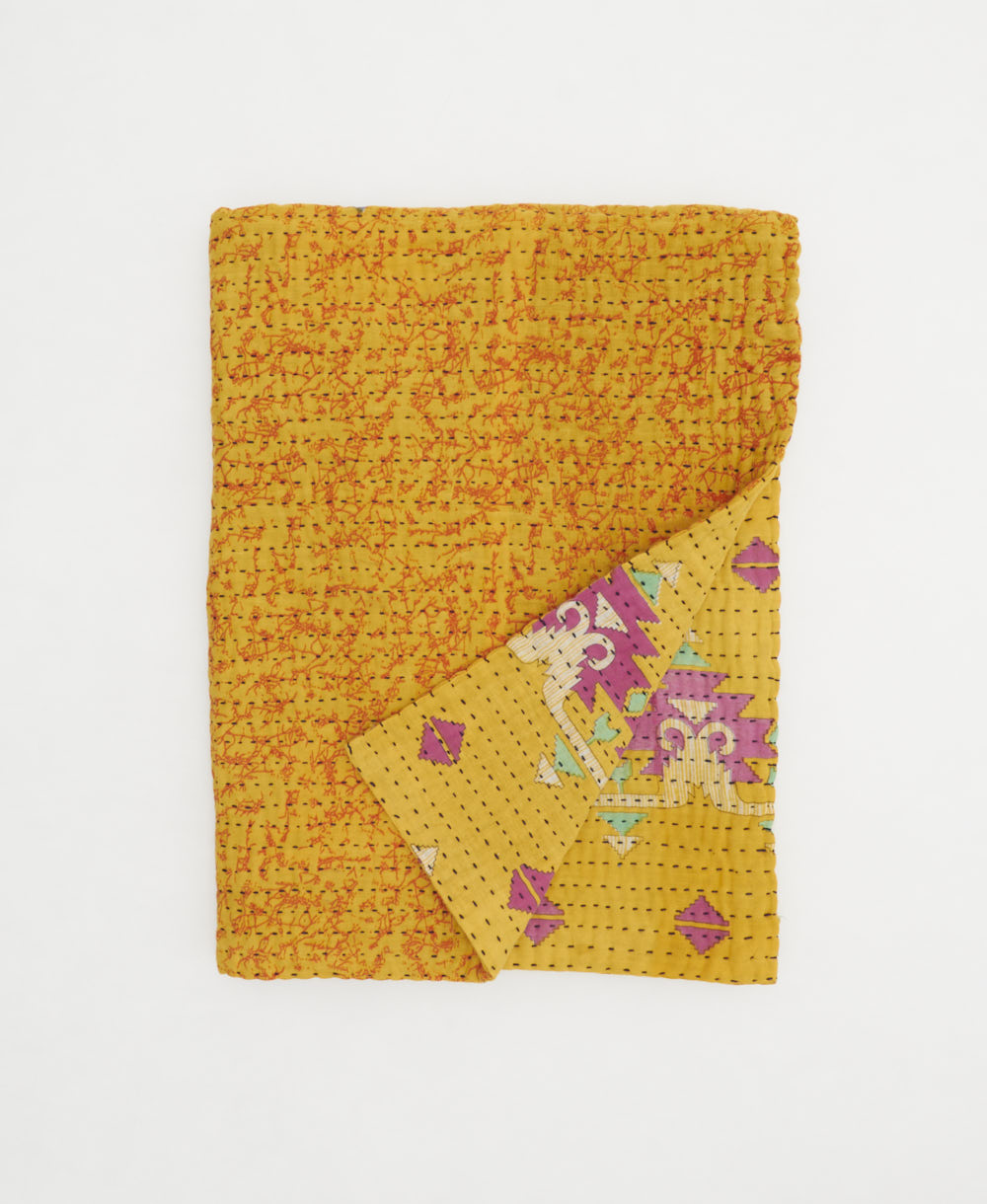 bright yellow small kantha quilt handmade in India by women artisans from vintage cotton saris