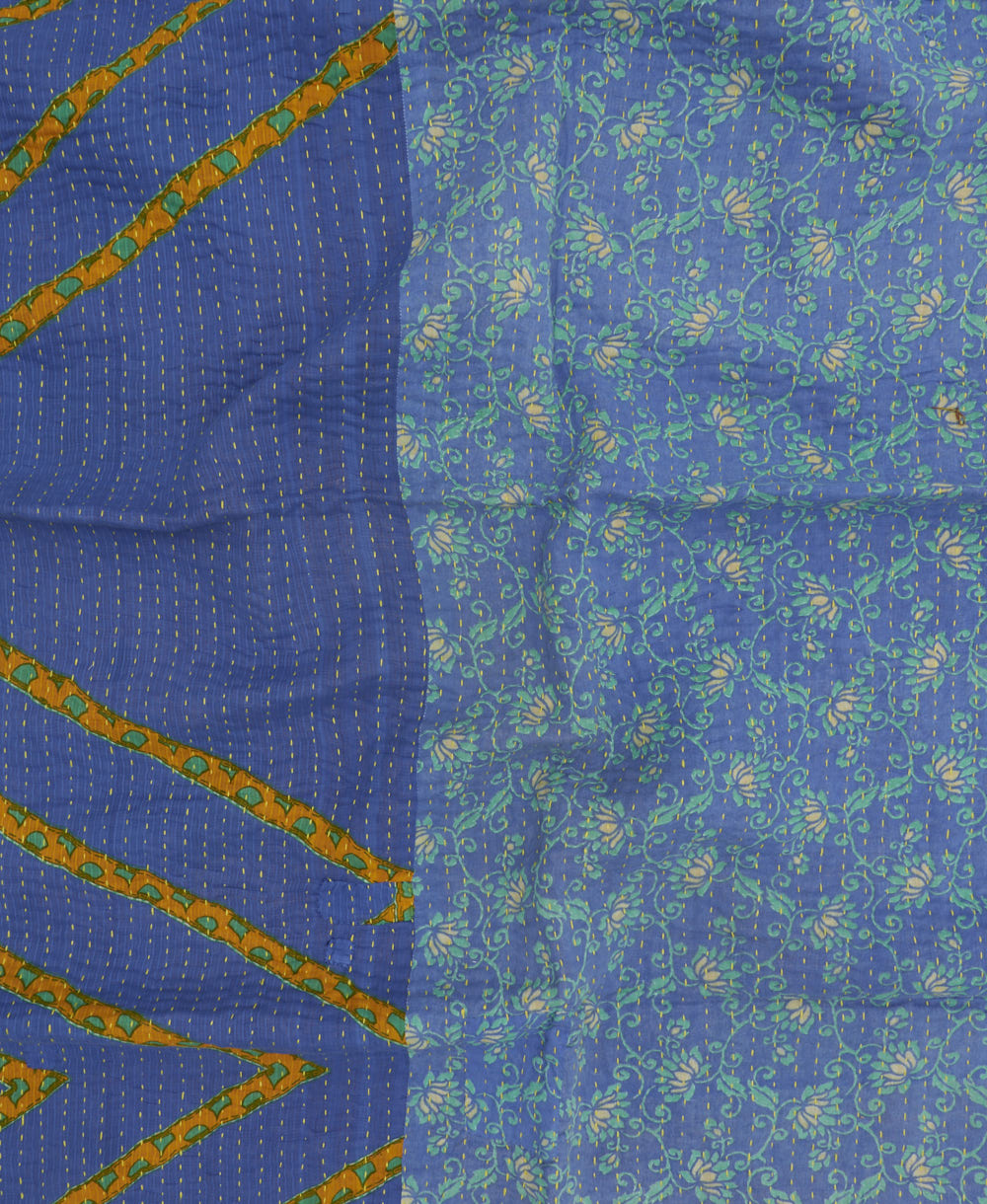 ocean blue kantha blanket with aqua floral print and yellow kantha stitching