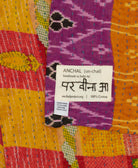 small kantha blanket with signature of the maker on the tag