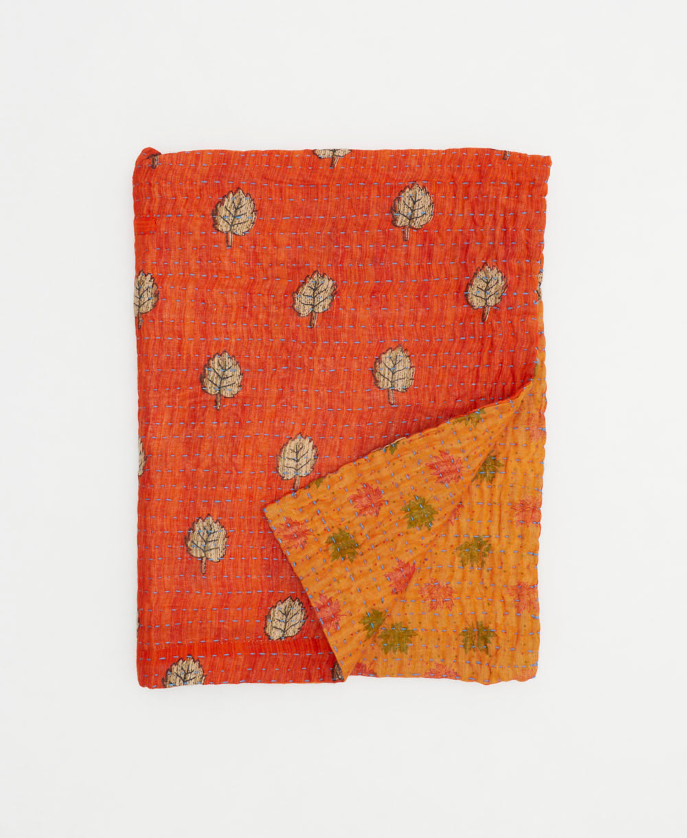 small kantha quilt handmade in India by women artisans from vintage cotton saris