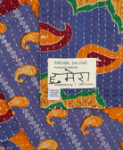 small kantha blanket with signature of the maker on the tag