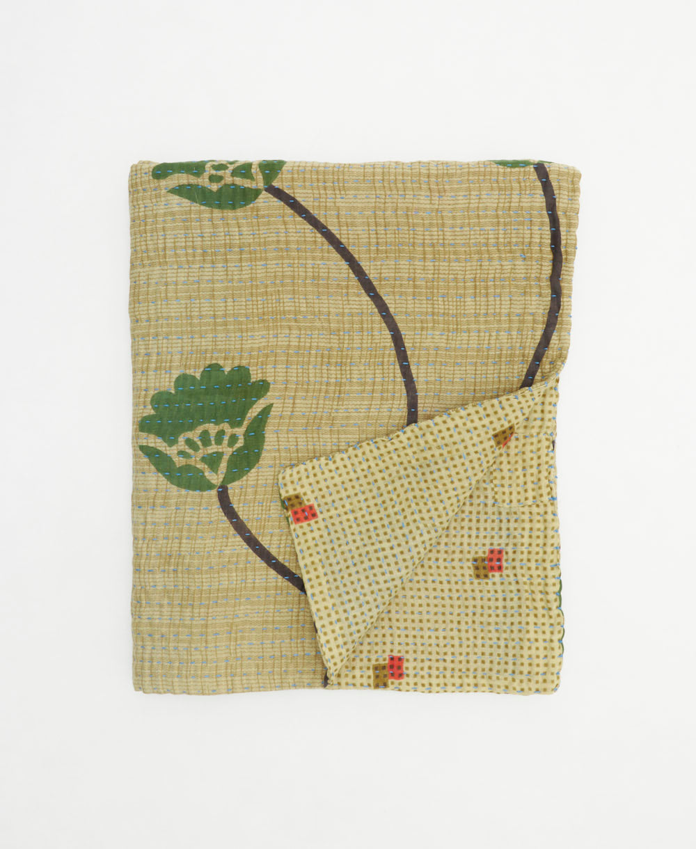 small kantha quilt handmade in India by women artisans from vintage cotton saris